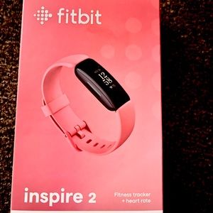 Brand New in the Box FitBit Inspire 2 comes with a one year premium trial!